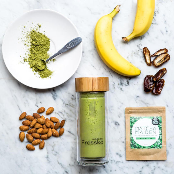 glass fressko flask with matcha banana and date smoothie