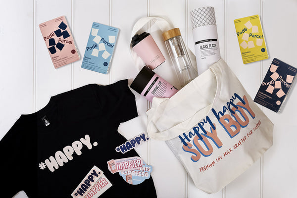 Prize pack with pod and parcel coffee pods happy happy soy boy t-shirt and fressko flask and cup